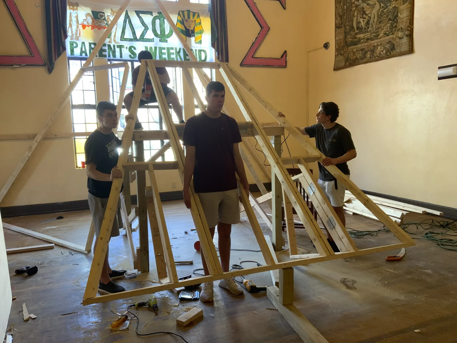 Completed collapsible 21-foot DJ pyramid and its construction